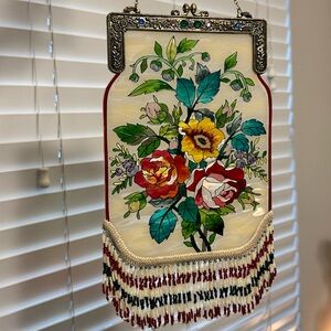 Amia purse shaped beaded suncatcher.